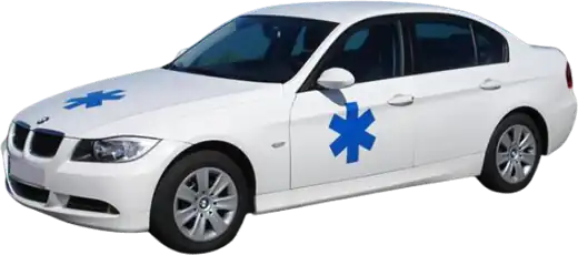 Véhicule sanitaire VSL blanc avec croix bleue